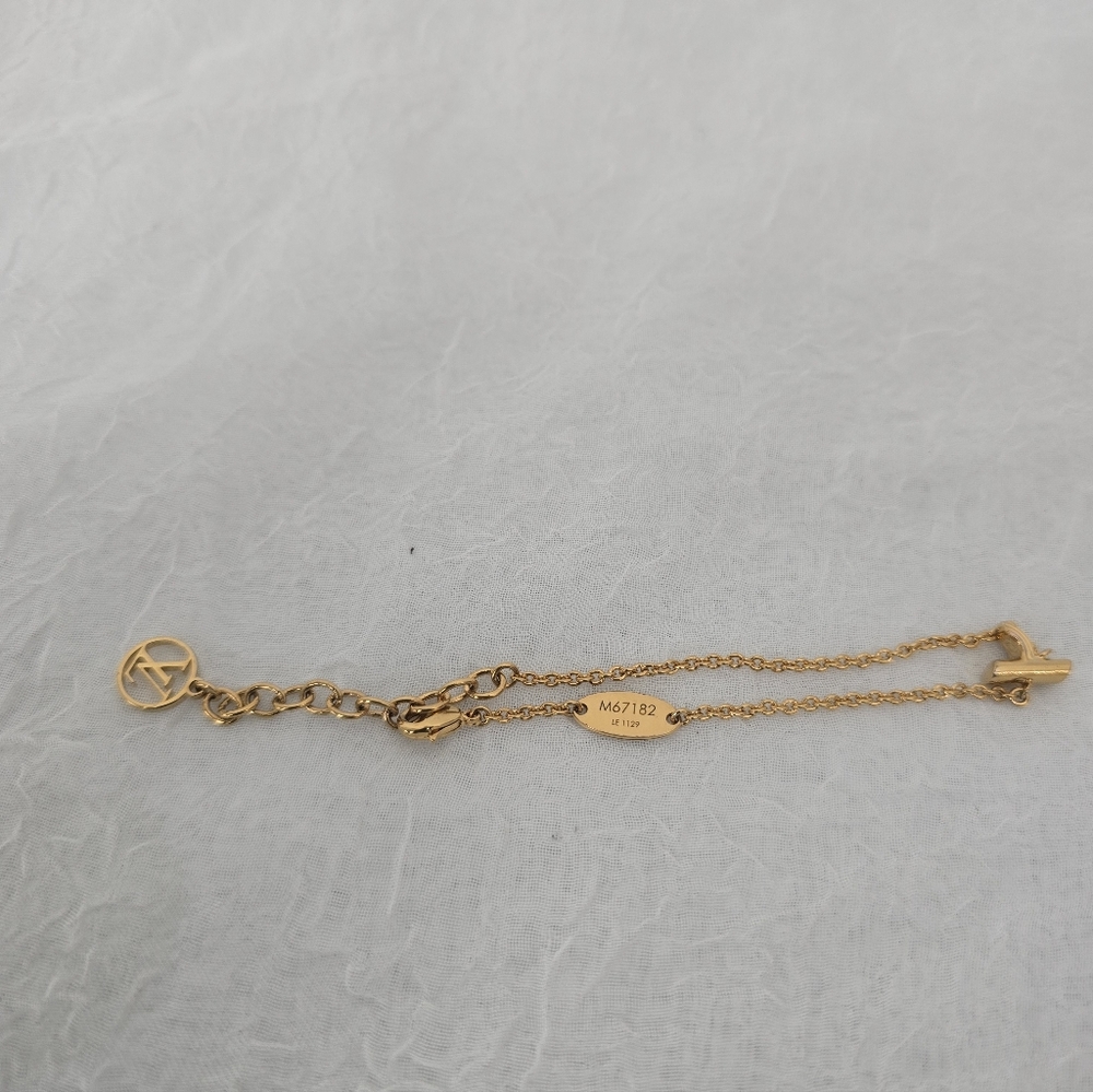 LOUIS VUITTON Gold Charm Bracelet - Picture 3 of 9